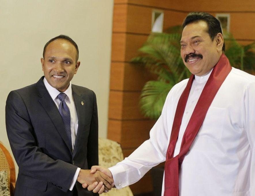 A closer view of the handshake at the start of the Sri Lankan call.